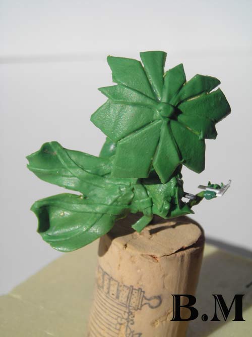 statuette imper  parapluie